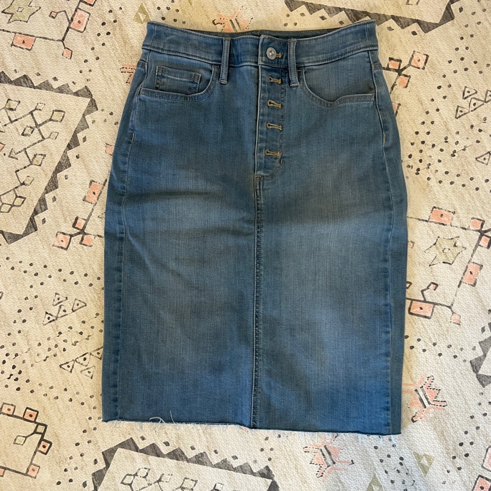 Banana republic size 0 denim skirt. Knee length. Slit in back.